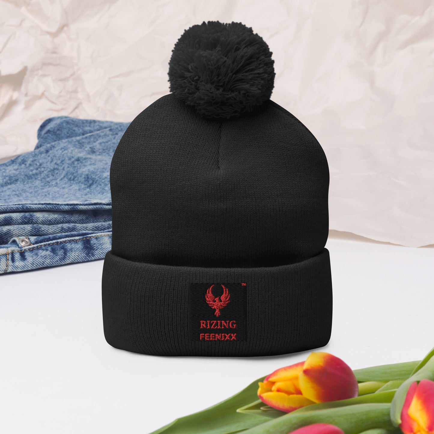 RIZING FEENIXX™ POM-POM BEANIE