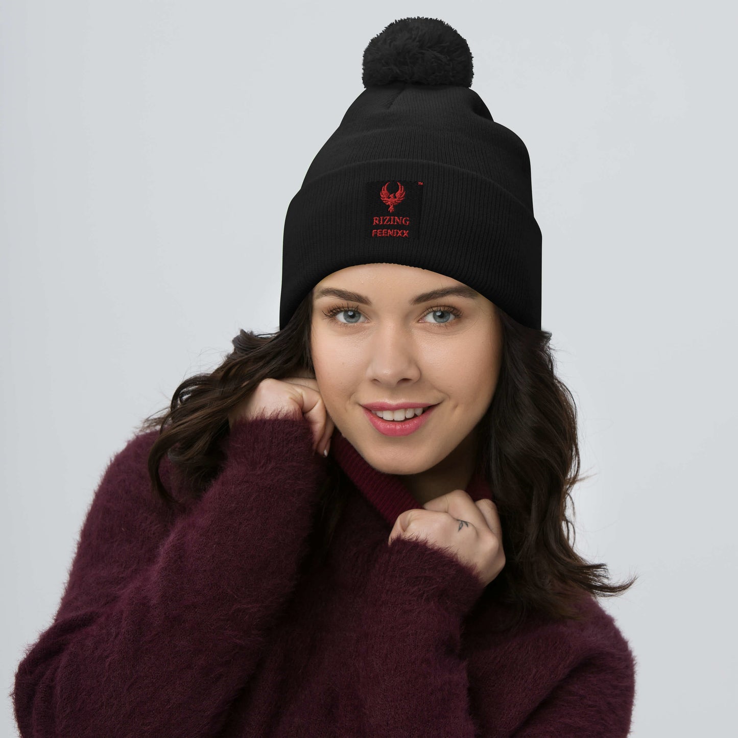 RIZING FEENIXX™ POM-POM BEANIE