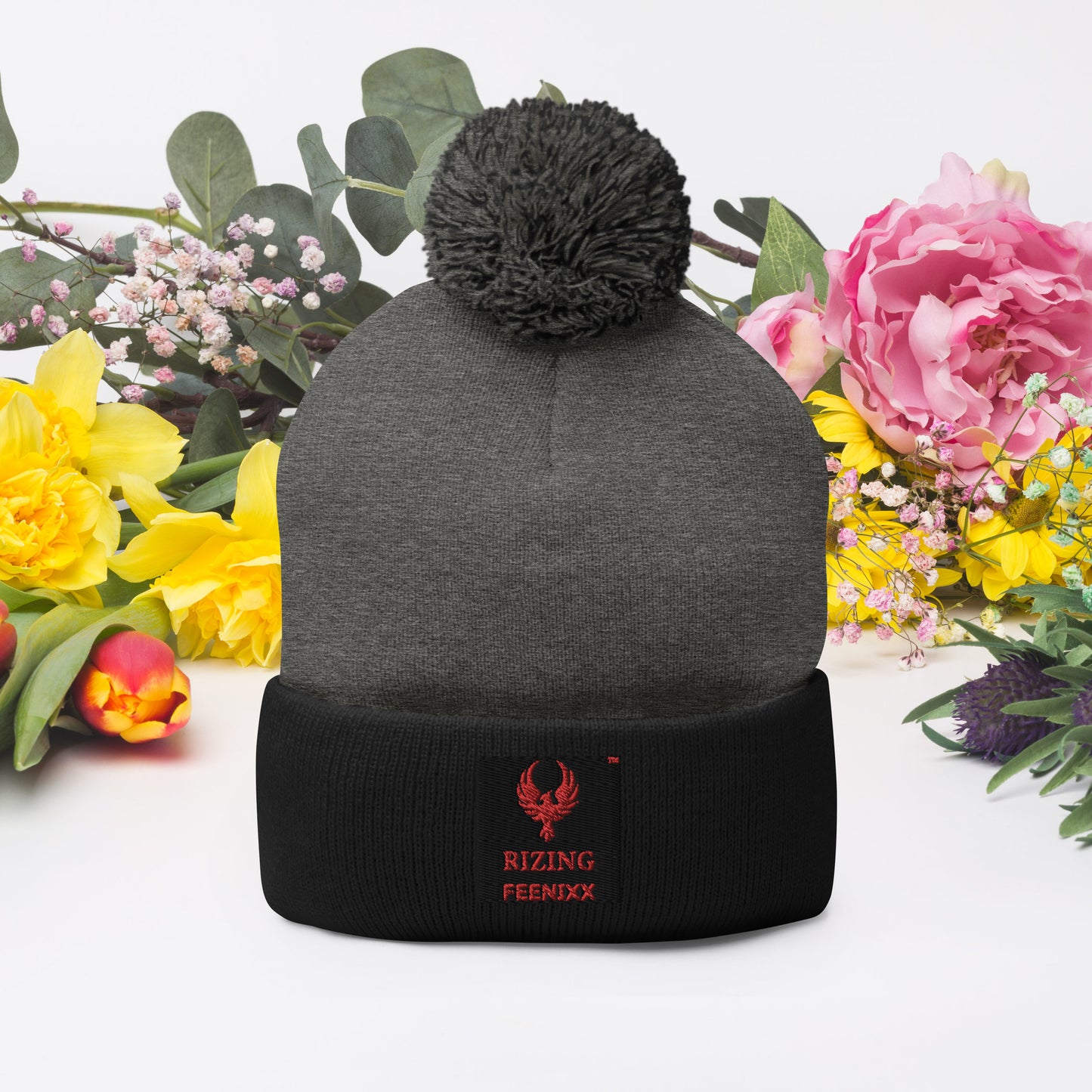 RIZING FEENIXX™ POM-POM BEANIE