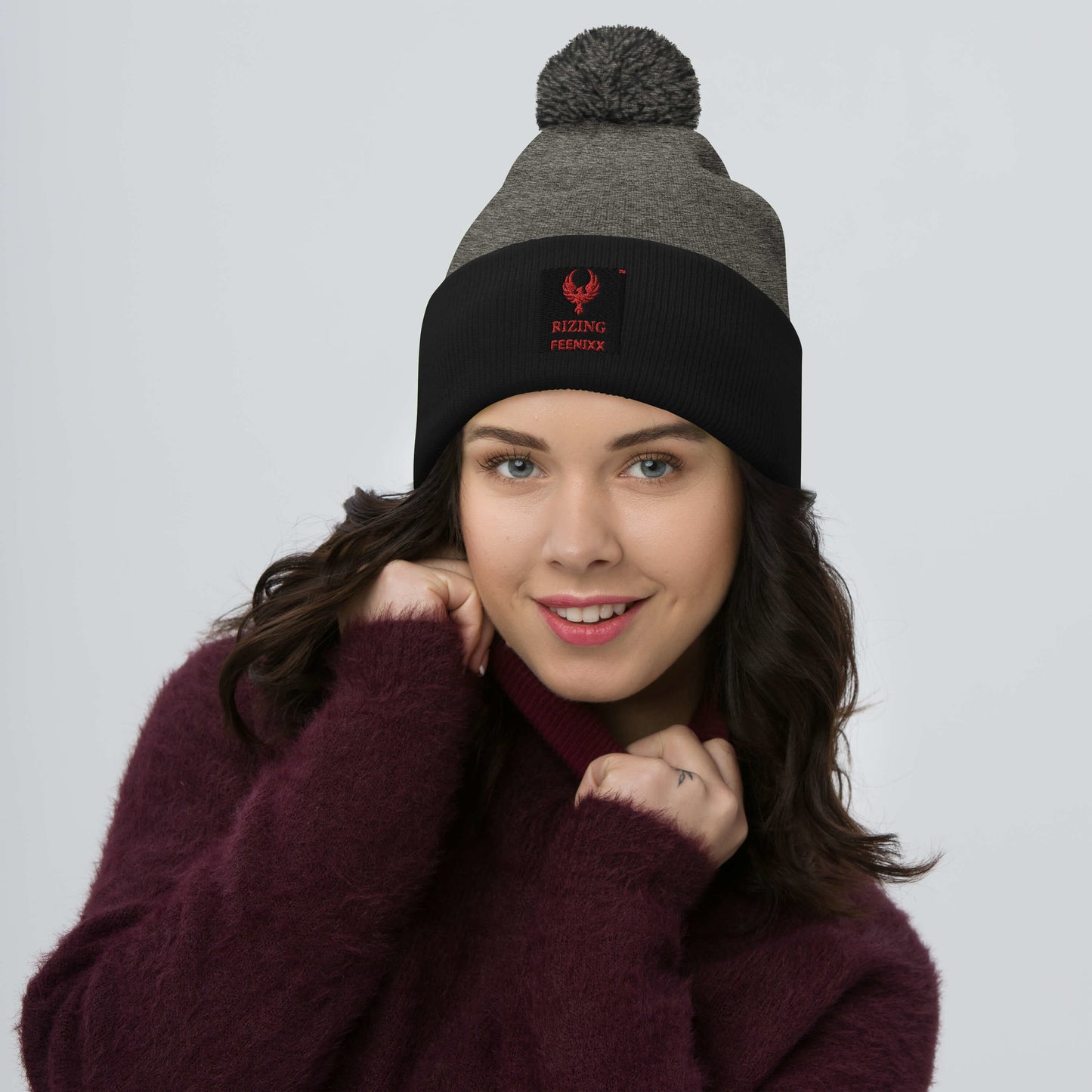 RIZING FEENIXX™ POM-POM BEANIE