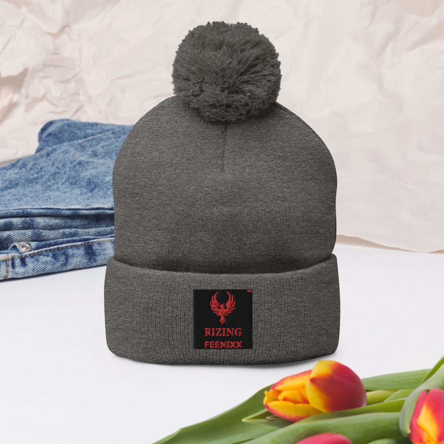 RIZING FEENIXX™ POM-POM BEANIE