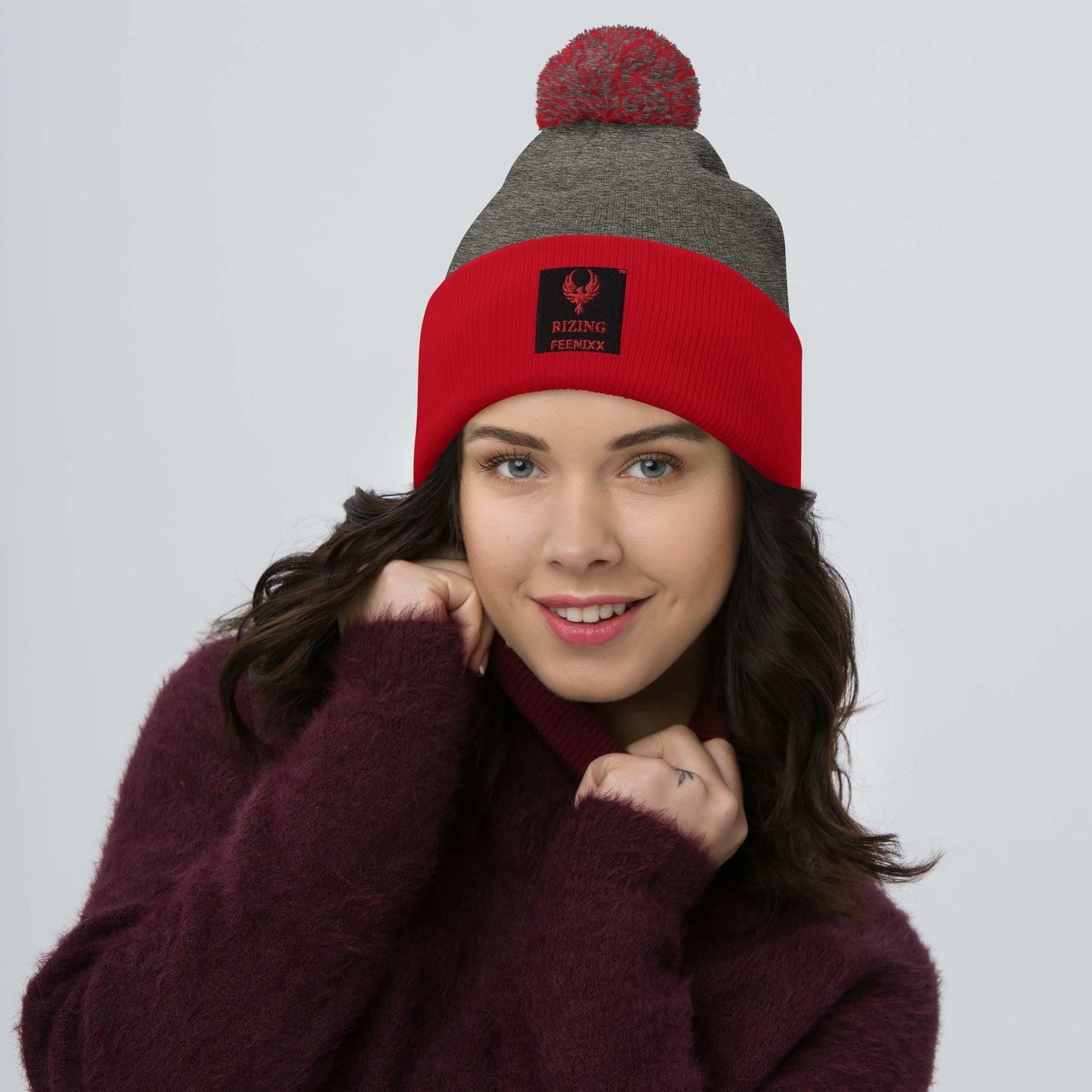 RIZING FEENIXX™ POM-POM BEANIE