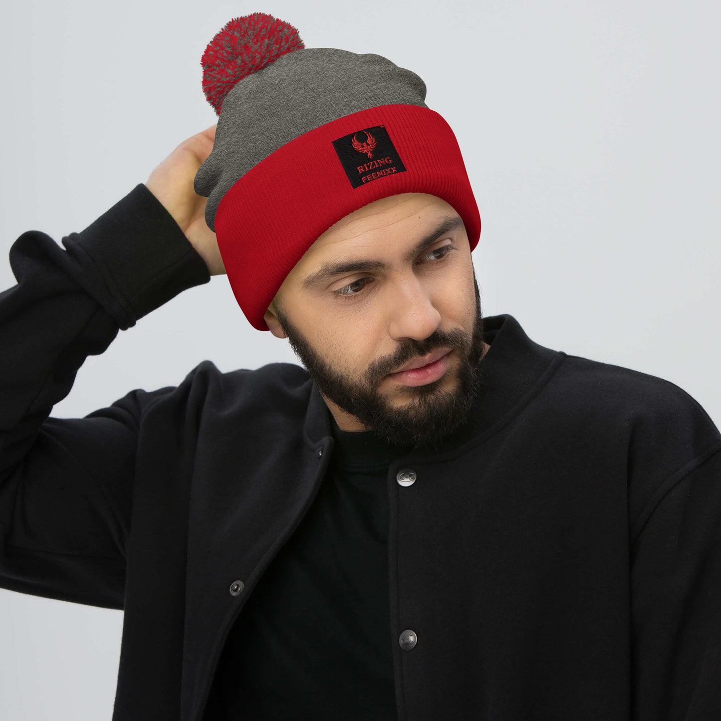 RIZING FEENIXX™ POM-POM BEANIE