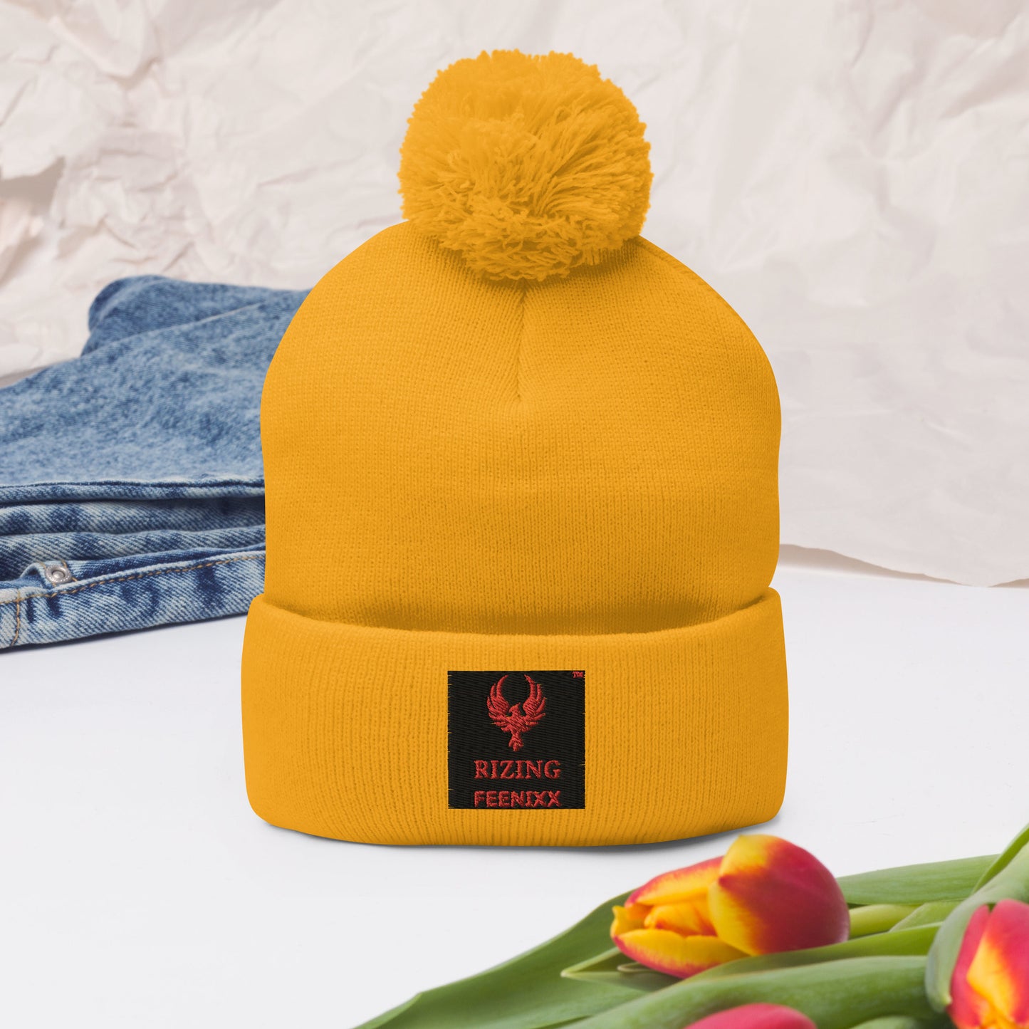 RIZING FEENIXX™ POM-POM BEANIE