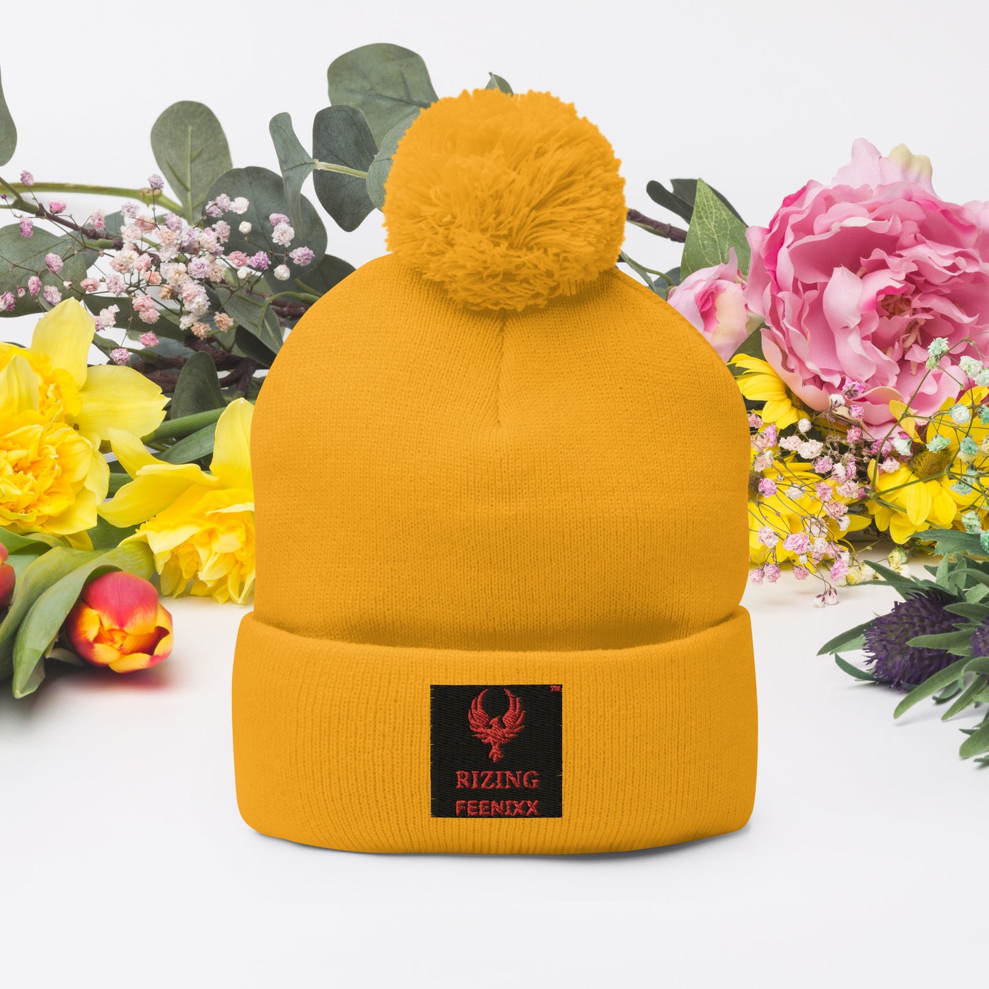 RIZING FEENIXX™ POM-POM BEANIE