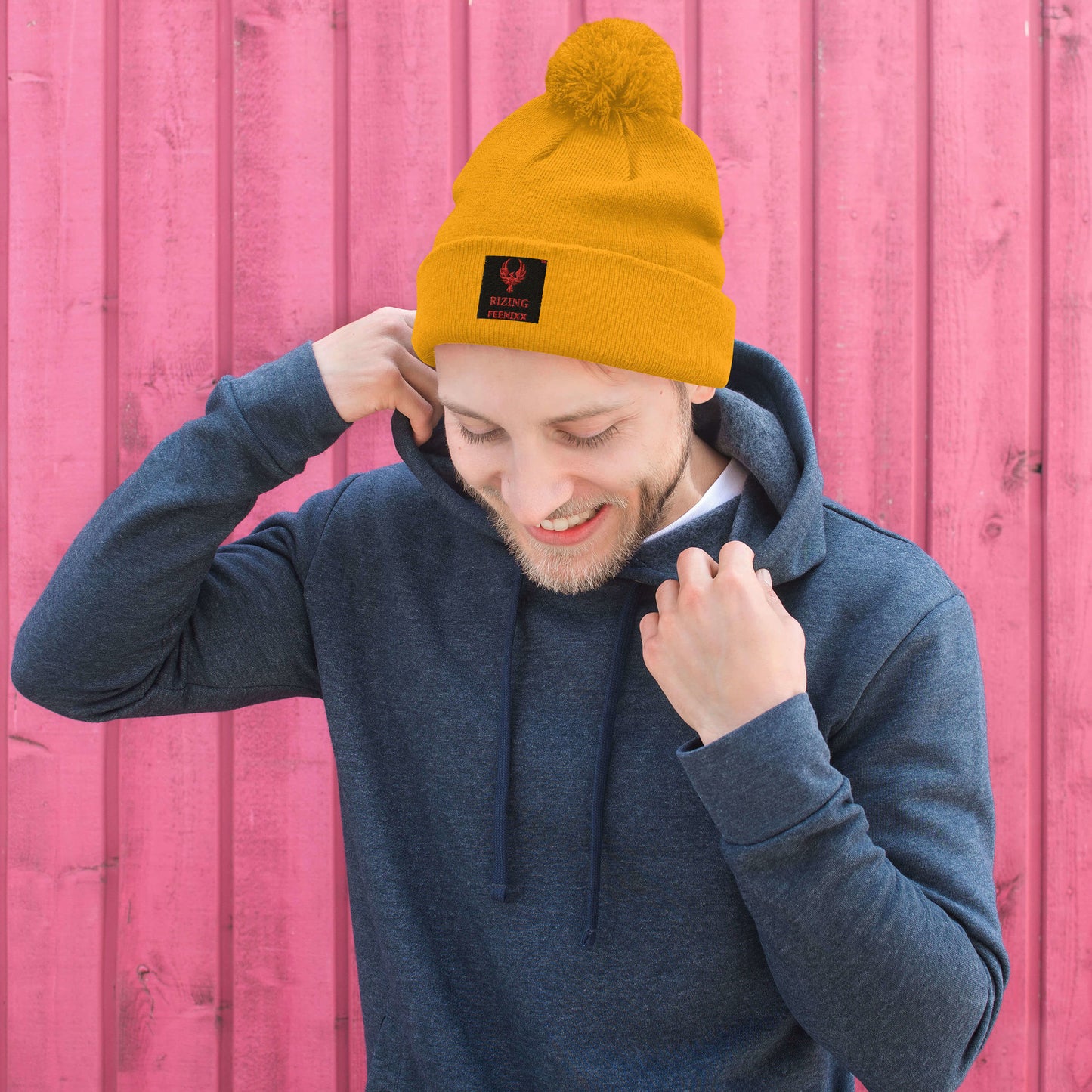 RIZING FEENIXX™ POM-POM BEANIE