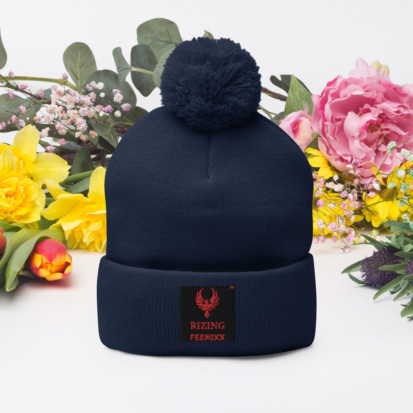 RIZING FEENIXX™ POM-POM BEANIE