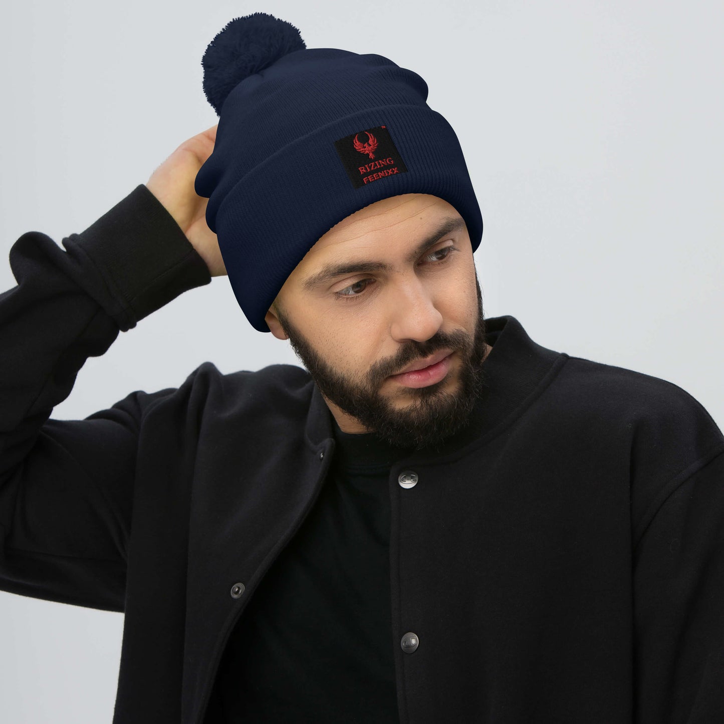 RIZING FEENIXX™ POM-POM BEANIE