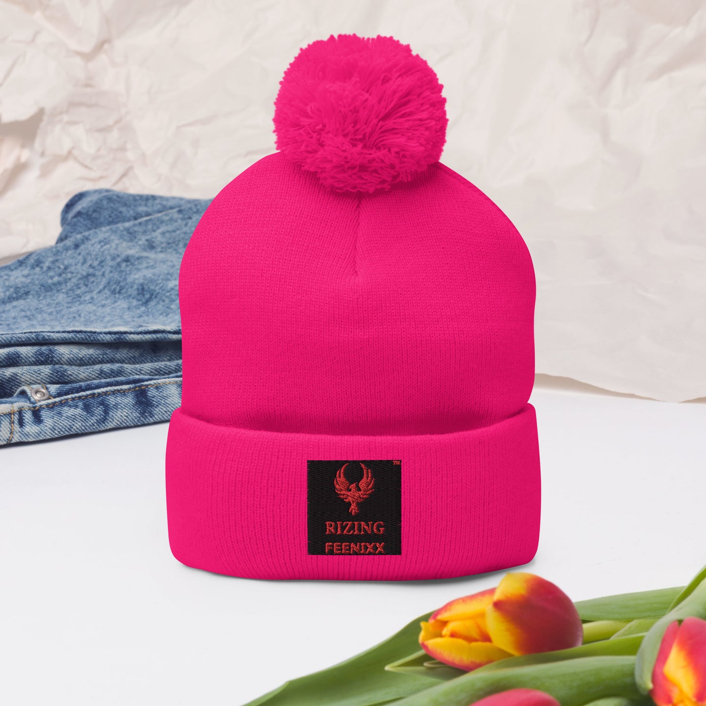 RIZING FEENIXX™ POM-POM BEANIE