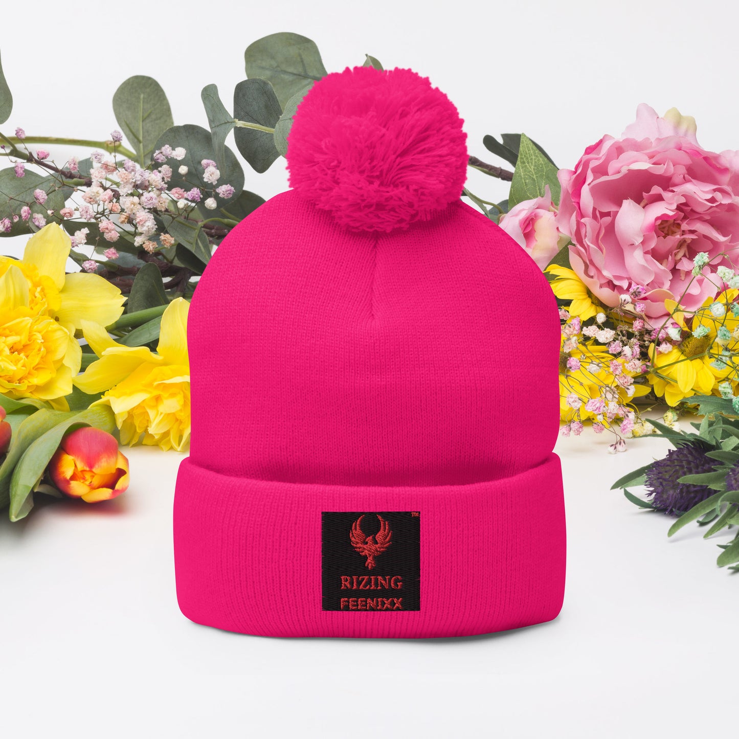 RIZING FEENIXX™ POM-POM BEANIE