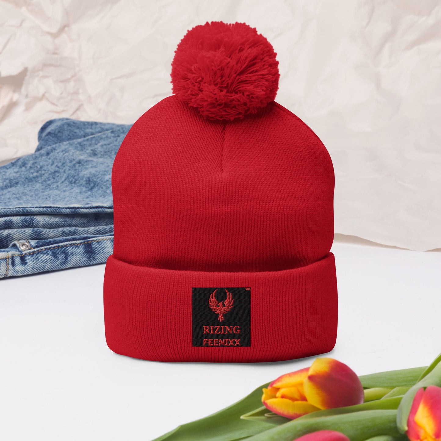 RIZING FEENIXX™ POM-POM BEANIE