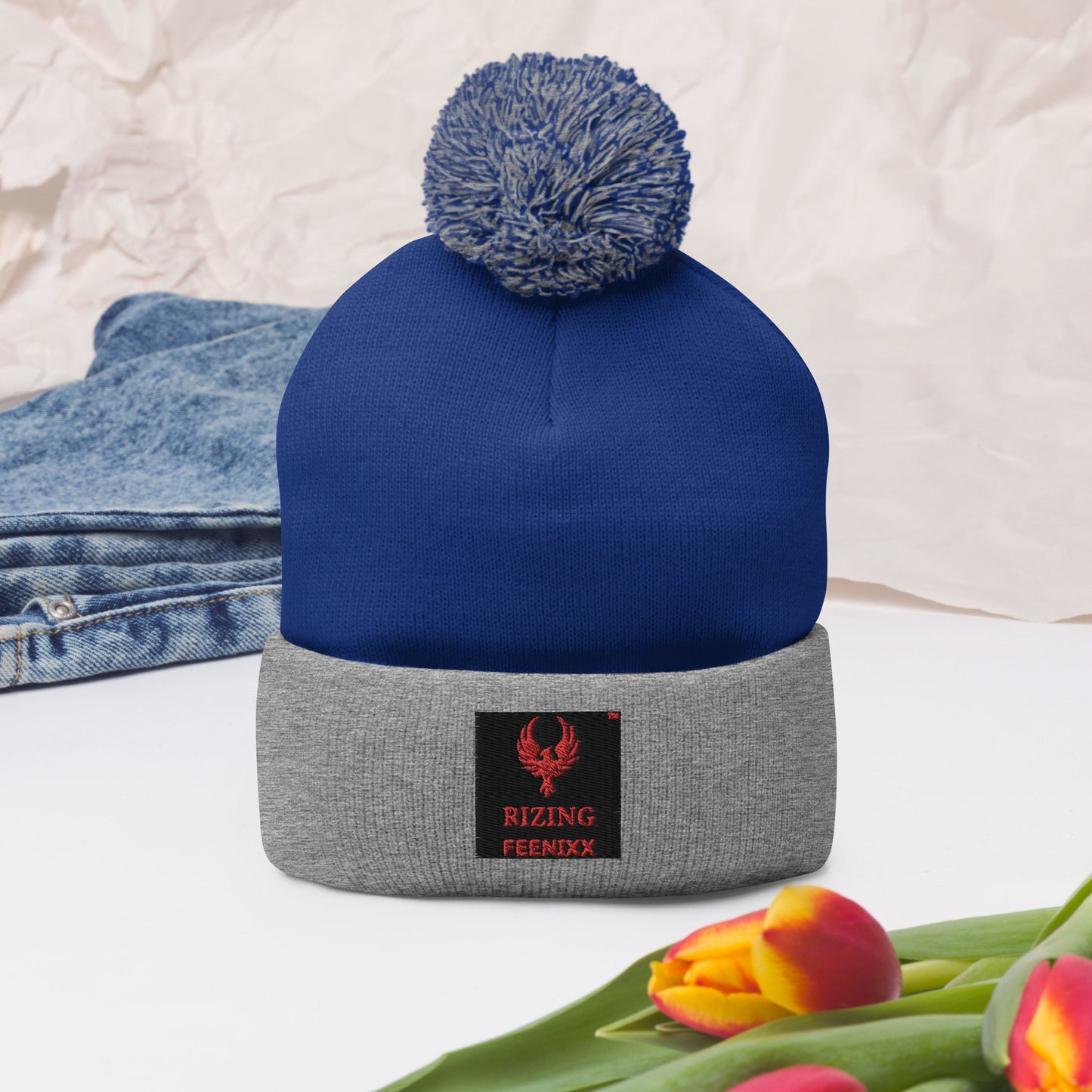 RIZING FEENIXX™ POM-POM BEANIE