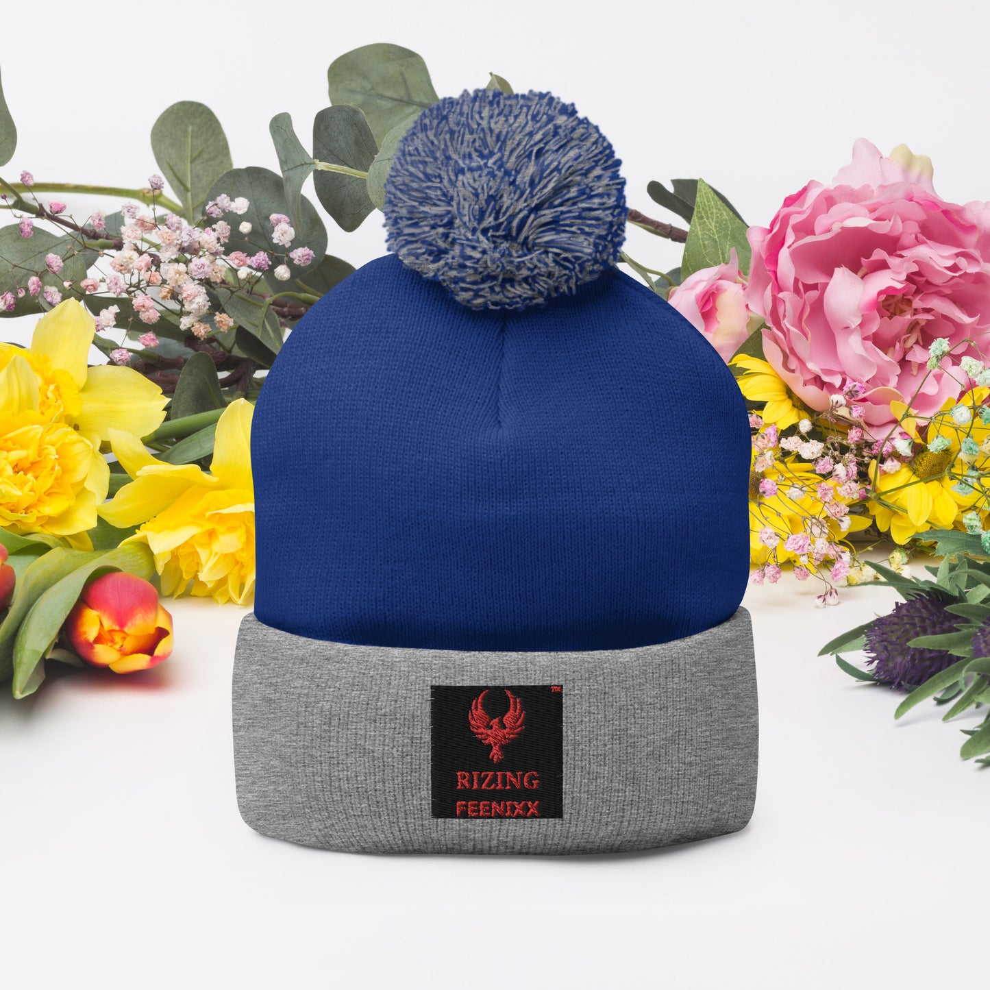 RIZING FEENIXX™ POM-POM BEANIE