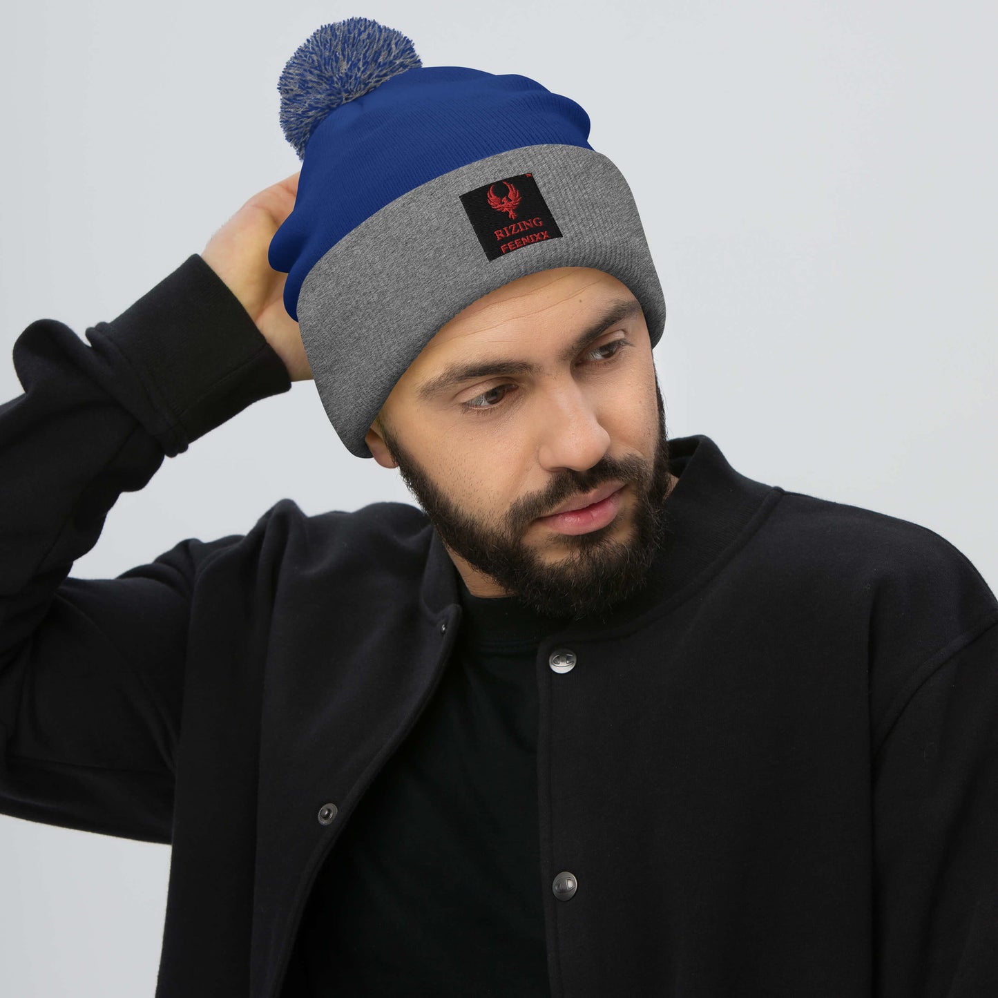 RIZING FEENIXX™ POM-POM BEANIE